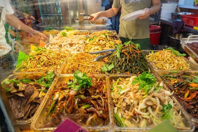 Signature Urban Night Tour: Sunset Street Food in Singapore - Clifford Pier and the Fullerton Bay waterfront