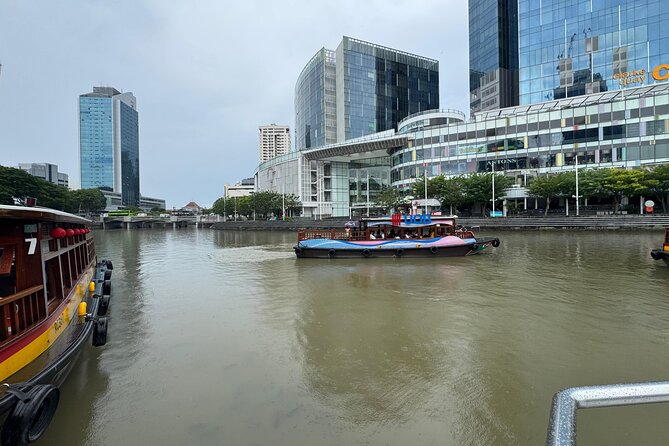 Singapore River Cruise, Night Garden Rhapsody and Spectra Tour - Merlion Park begins the evening with the classic view